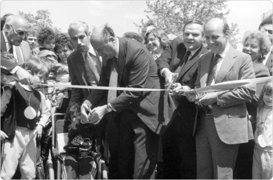 Opening ceremonies for the Playground for All Children in Flushing Meadows Corona Park, including Parks Commissioner Henry Stern, Mayor Ed Koch, Queens borough president Donald Manes, and City Comptroller Harrison J. Goldin, June 1984. Courtesy of Parks Photo Archive; Neg. 42255.