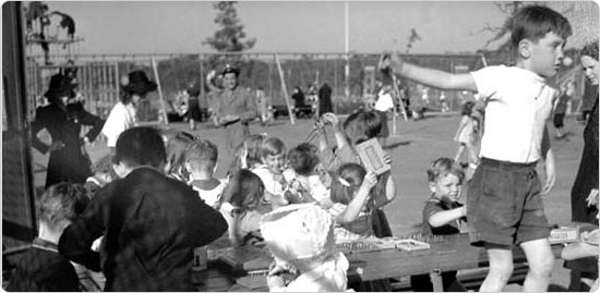 Children at a picnic table in Van Cortlandt Park, playing games, October 1, 1939. Courtesy of Parks Photo Archive.