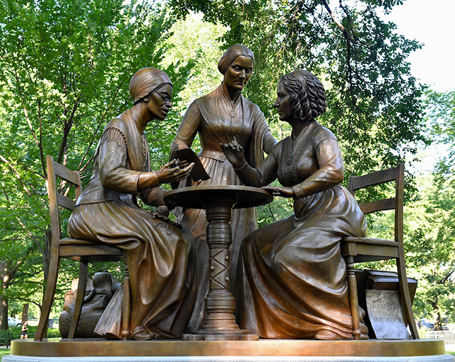 A historic lifelike bronze scuplture of three women (Sojourner Truth, Susan B. Anthony, and Elizabeth
          Cady Stanton).