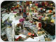 Image of Candles, flowers and Beatles mementos cover the Imagine monument the day after George Harrison?s death. Photo by S.T. Tucker