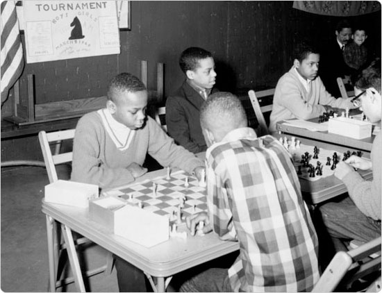 A chess tournament at Colonial Park (now Jackie Robinson Park), part of an effort to expand cultural recreation in parks, March 5, 1966. Courtesy of Parks Photo Archive.