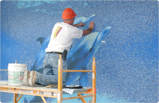 Placing the final tiles in the Chelsea Recreation Center mural, September 23, 2003. Photo by Spencer T. Tucker.