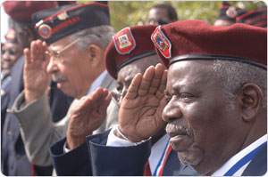 Veterans salute at the 369th Infantry Regiment monument unveiling, September 29, 2006. Photo by Daniel Avila.