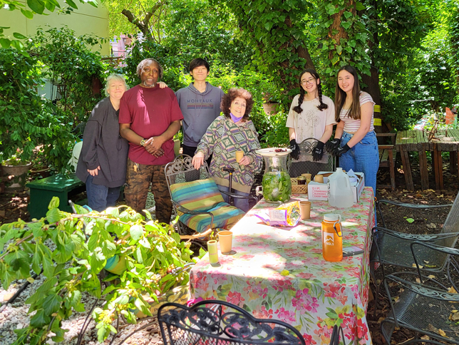 people attend a community garden event