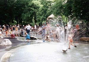 image of kids playing in fountain