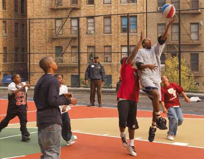 Basketball players at Rock Garden Park, Bronx.