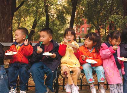 Children eat cake in the Lower East Side