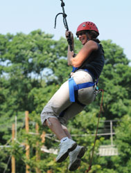 Person in the air on the Adventure Course