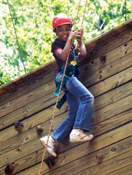 Girl Climbing Rock Wall