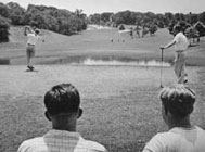 Golfer swinging a club