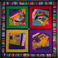 Photo of a quilt from the Reaching for the Sun gallery exhibit, links to more information and pictures from the show.