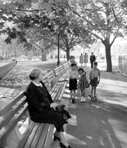 Archive Photo of Woman Sitting on a Park with Children