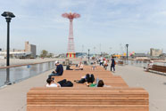 Coney Island pier with parachute drop in background