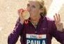 Paula Radcliffe kisses her medal