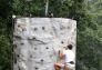 Scaling a rock climbing wall