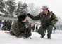 A man is instructed in the ways of ice rescue.